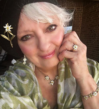 March 2025 Angela launches her Edelweiss Collection of Jewelry designed by Michael Michaud