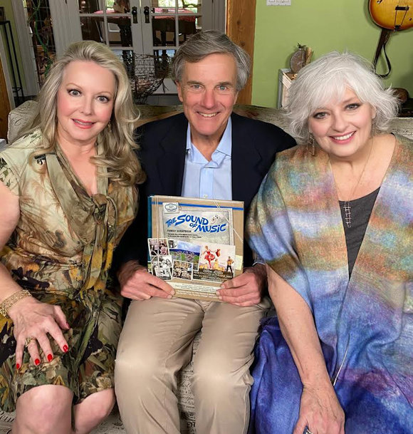 Kym, Nickolas & Angela with their 'Sound of Music Family Scrapbook'.crapbook